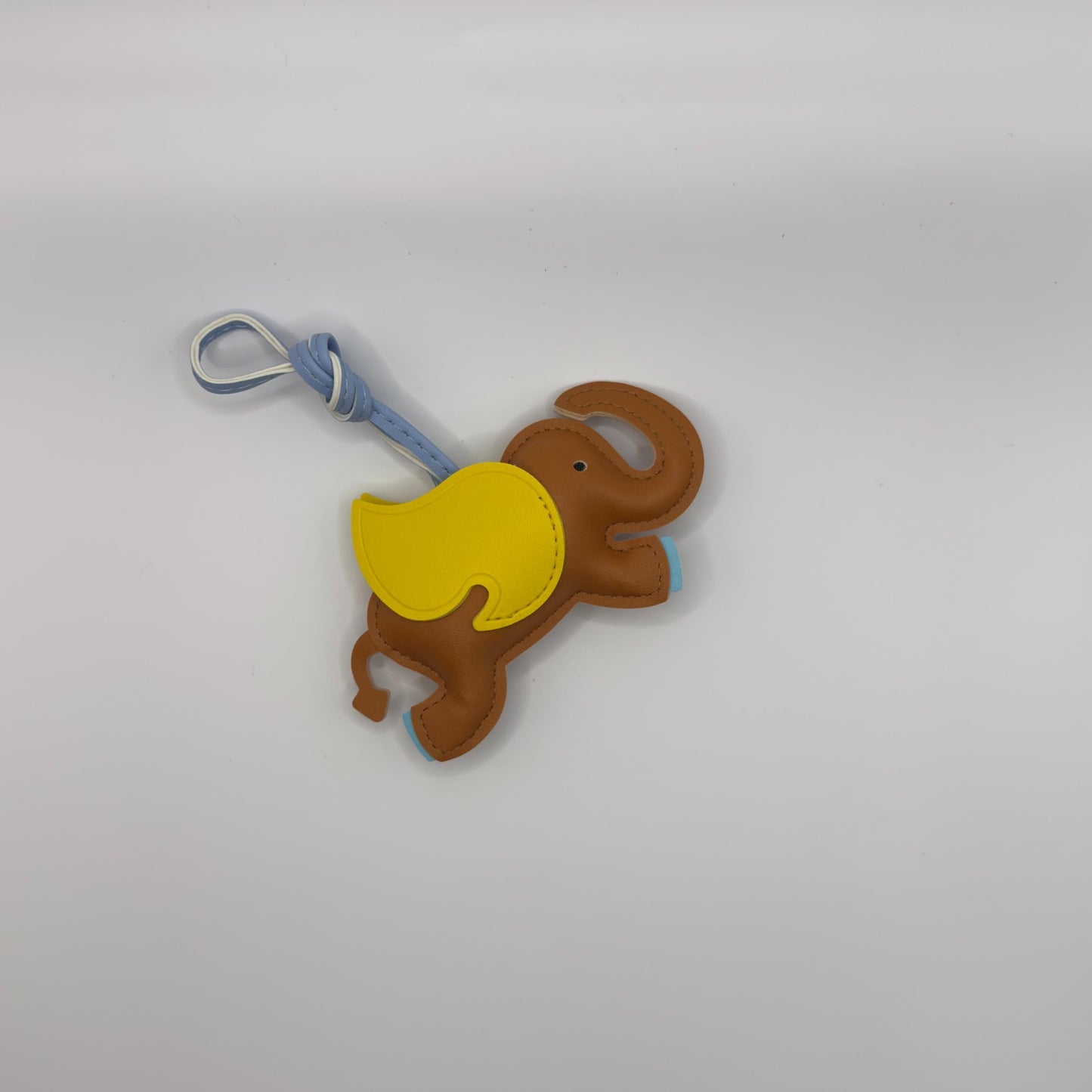 Flying Elephant Charm in Brown