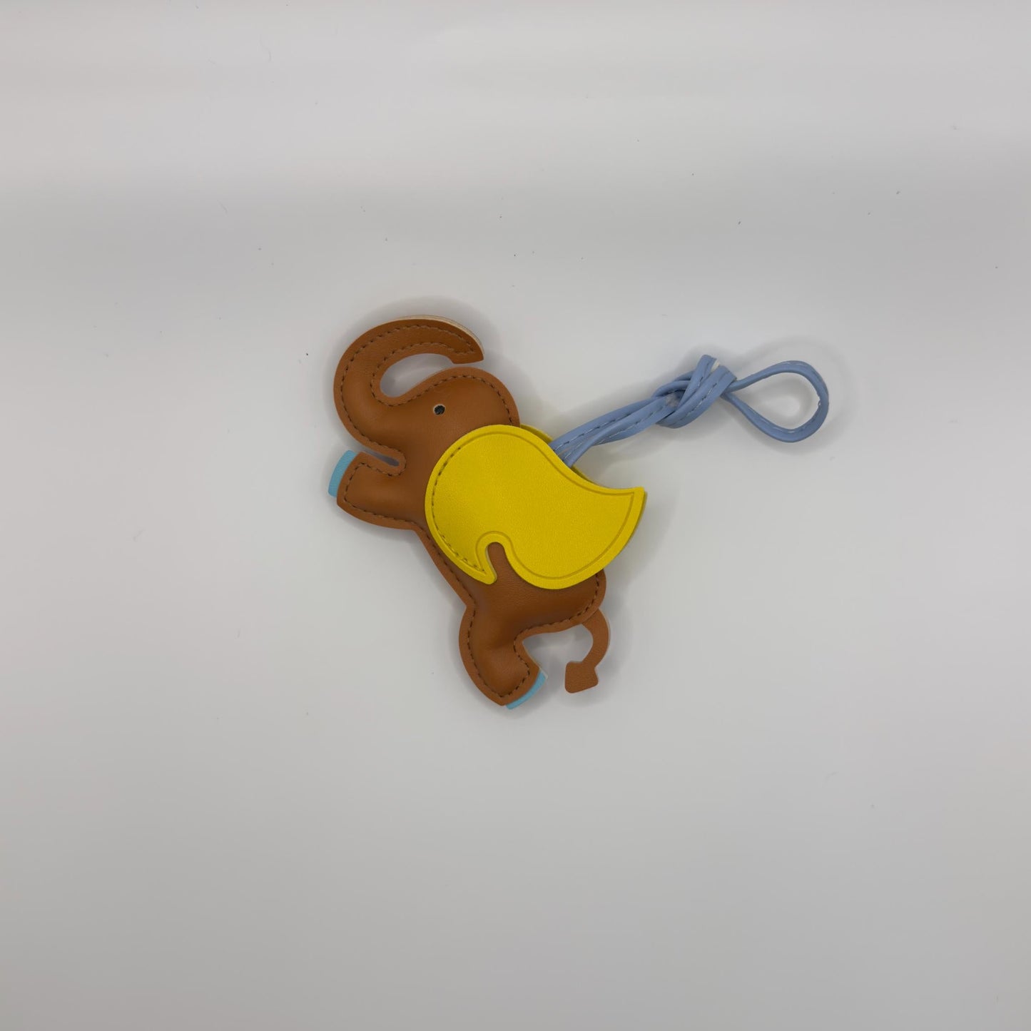 Flying Elephant Charm in Brown