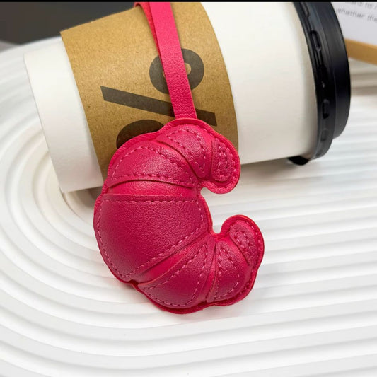 pink croissant bag charm